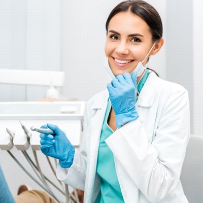 dentist smiling toward the camera