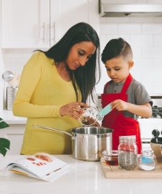 Mother and child cooking together